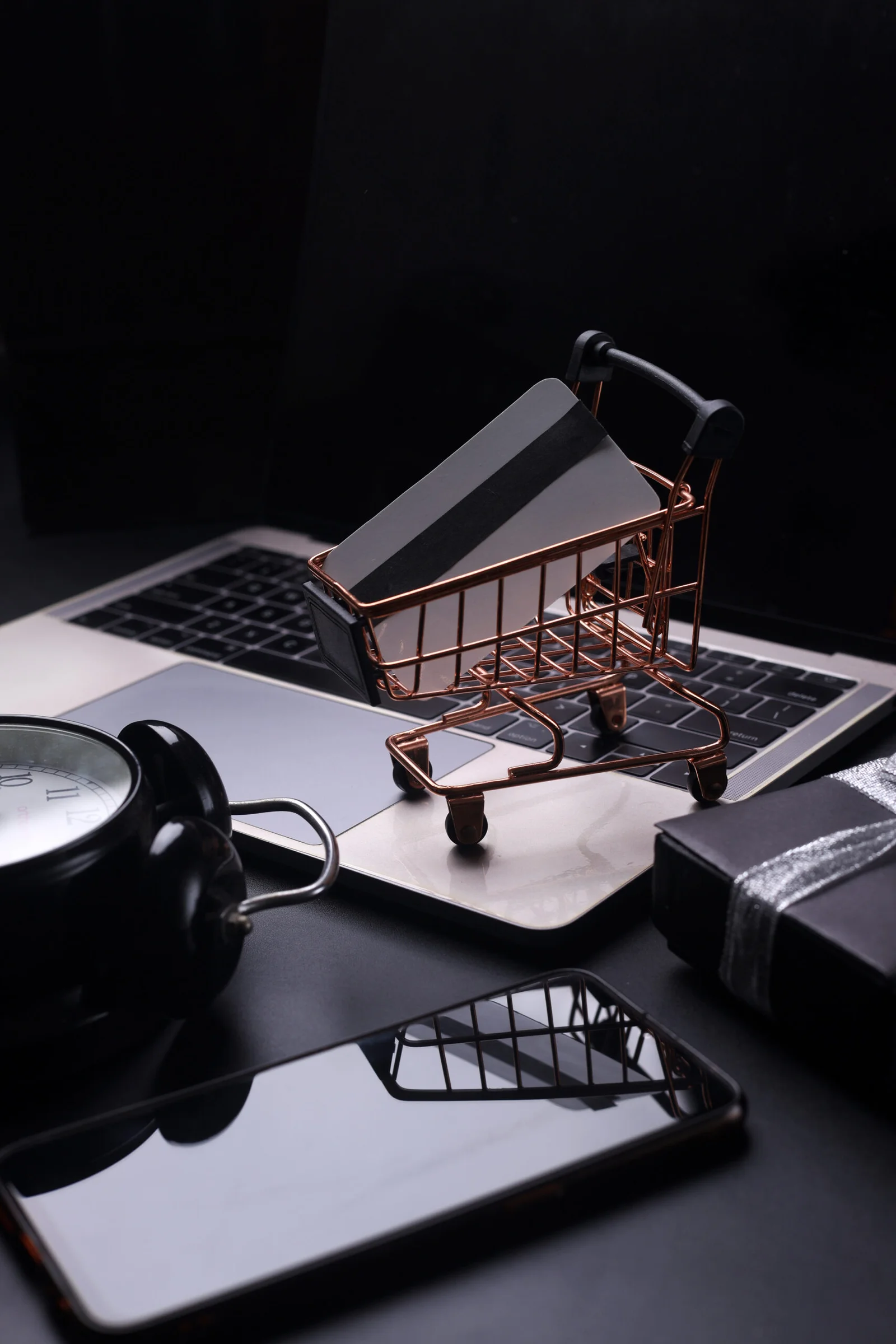 https://rishfotech.com/wp-content/uploads/2025/09/black-friday-concept-with-technology-mini-trolley-alarm-clock-gift-box-smartphone-laptop-iso-scaled-1.webp